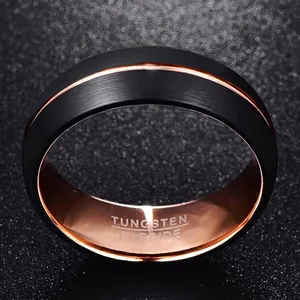 Detail shot of 8mm black matte tungsten steel ring with a rose gold inner band