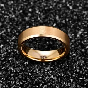 Macro view showing the 6mm wide gold plated tungsten ring with a premium brushed finish