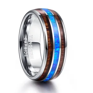 8mm tungsten carbide wedding band with koa wood and vibrant blue opal inlay detail