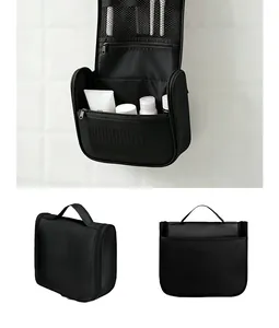 Neceser de viaje colgante negro con tres vistas del diseño interior y exterior