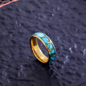 Macro shot of a 6mm tungsten carbide ring featuring a turquoise inlay and gold wire.