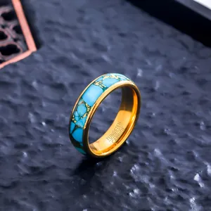 Close-up detail of 6mm wide gold plated tungsten carbide ring with turquoise inlay