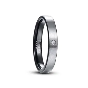 Detailed macro view of 4mm matte steel tungsten carbide ring featuring a zircon stone