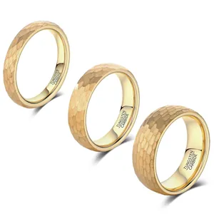 Detail showing three gold hammered tungsten carbide rings in 4mm 6mm and 8mm widths