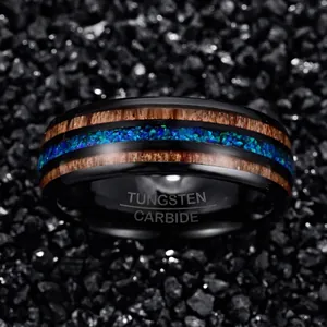 8mm black tungsten carbide ring with Koa wood and blue opal inlay detail