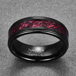 Detailed view of an 8mm black tungsten carbide ring featuring a red dragon pattern inlay