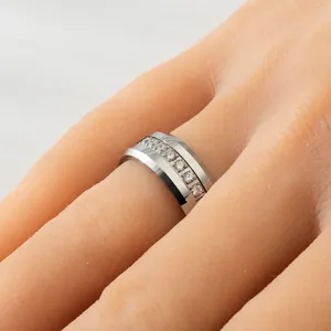 Close-up of a premium 8mm silver tungsten steel men's ring with inlaid cubic zirconia stones.