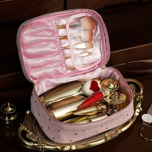 Large capacity pink velvet makeup bag with gold star pattern and internal brush organizer