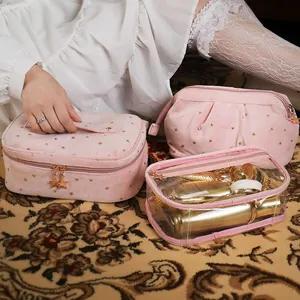 Pink velvet makeup bag set with embroidered gold stars and transparent PVC travel pouch