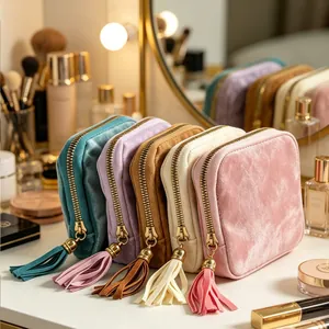 Bolsa de joyería de terciopelo portátil con borlas y cremalleras doradas