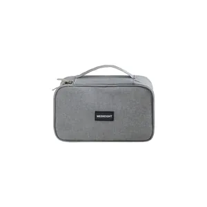 Bolsa organizadora de accesorios electrónicos de tela catiónica gris con asa y cremallera