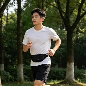 Lightweight waterproof running waist bag for phones shown in an outdoor forest setting
