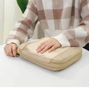Detailed view of the beige travel storage bag with mesh and zip closure