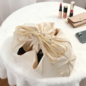 Organisateur de sac cosmétique beige à cordon pour sacs à main avec compartiments
