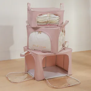 Large capacity pink fabric storage boxes with transparent windows for clothes and quilts.