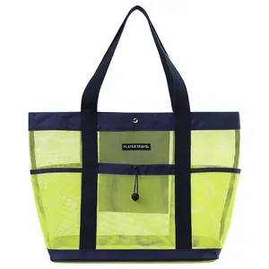 Grote neon groene mesh strandtas met multifunctionele zakken voor op reis en zwemmen