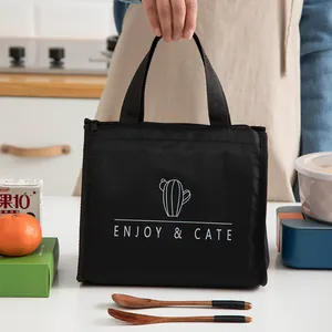 Sac à déjeuner isotherme noir avec imprimé cactus et poignée pour le bureau et l'école.