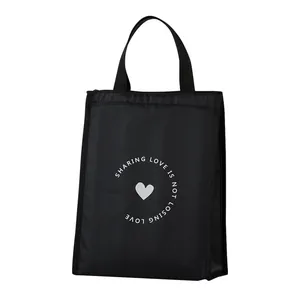 Sac à déjeuner isotherme noir avec doublure en aluminium étanche et motif de coeur blanc