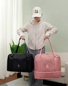 Large capacity travel and quilt storage duffle bags in black and pink colors shown