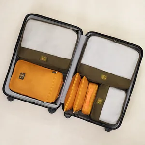 7-piece travel packing cube set for suitcase organization in mustard yellow and olive