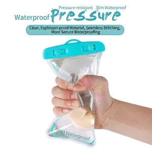 Universal transparent waterproof phone pouch with secure seal and teal top for swimming