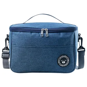 Blue portable insulated lunch bag with shoulder strap and thick aluminum foil lining