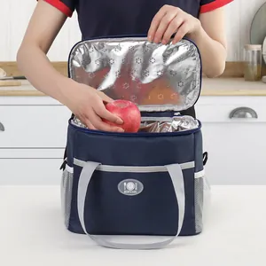Large capacity insulated lunch bag with waterproof foil lining and shoulder strap for picnic.