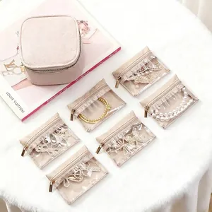 Portable faux leather jewelry box set with six clear PVC zipper jewelry storage pouches