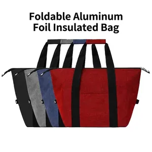 Set of portable insulated cooler bags in four colors for outdoor picnic and camping.