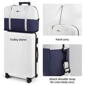 Waterproof two-tone travel duffle bag with luggage trolley sleeve and shoulder strap