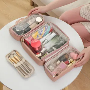 Large capacity waterproof pink makeup organizer bag with multiple compartments for travel
