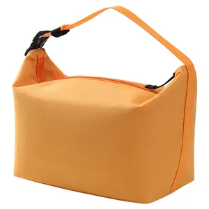 Portable insulated orange lunch bag with buckle handle and zipper for picnics and office lunches