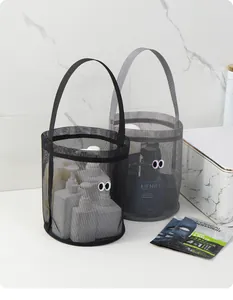 Detailed macro view of cute mesh bucket bags with eye designs for beach or bathroom