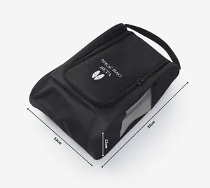 Detailed view of black portable travel shoe bag showing dimensions of 33x23x12cm