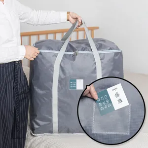 Large capacity grey quilt storage bag made of non-woven fabric for moving and home organization