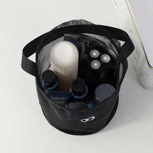 Black mesh bucket bag with cute eye embroidery for beach or toiletries bathroom storage