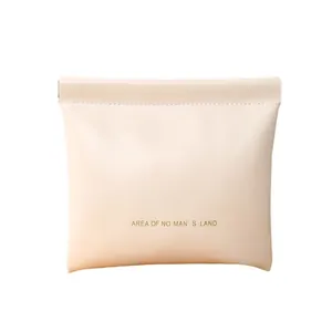 Minimalist cream-colored faux leather squeeze storage pouch for small items