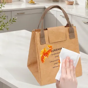 Stain-proof DuPont paper insulated lunch bag with portable handles in a clean kitchen setting