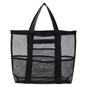 Large black mesh shower caddy tote with multiple pockets for bathroom storage and beach