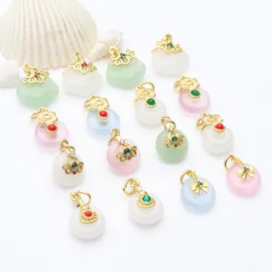 Collection of Chinese style jade pendants with gold accents for DIY jewelry making projects