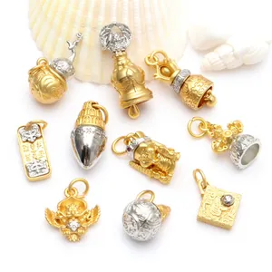 Collection of assorted Buddhist pendants in antique gold and silver finishes