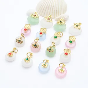Detailed view of colorful jadeite Ping'an buckle pendants with gold accents for DIY jewelry