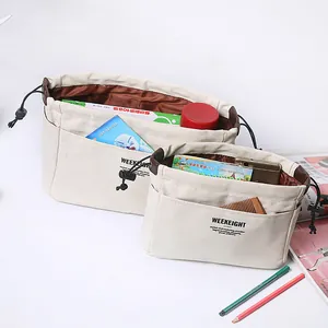Grand organisateur de sac en toile avec cordon et poches multiples pour le voyage