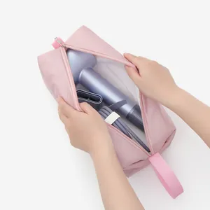 Bolsa de almacenamiento de viaje rosa impermeable para secador de pelo y accesorios