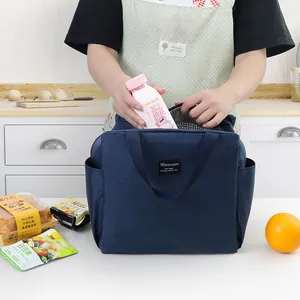 Large capacity insulated navy blue lunch bag with aluminum foil lining for office workers.