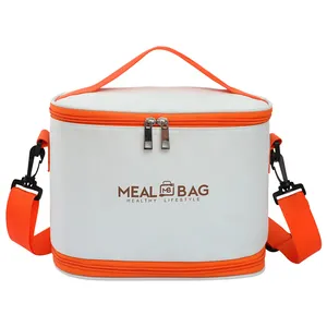 Portable cylindrical insulated lunch bag with vibrant orange straps and white body