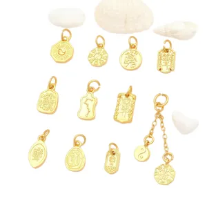 Close-up of golden sand gold Eight Trigrams and Yin Yang charms for DIY jewelry making