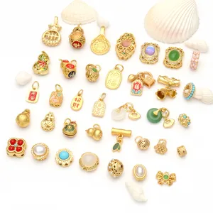 Detailed collection of antique gold Chinese style charms with colorful gemstone accents