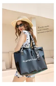 Large black waterproof beach bag for swimming with Player Travel logo printed straps
