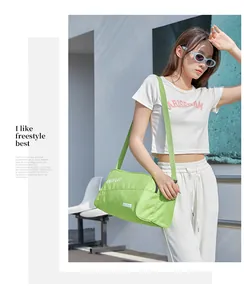 Model wearing a white outfit and carrying a large lime green fitness bag outdoors